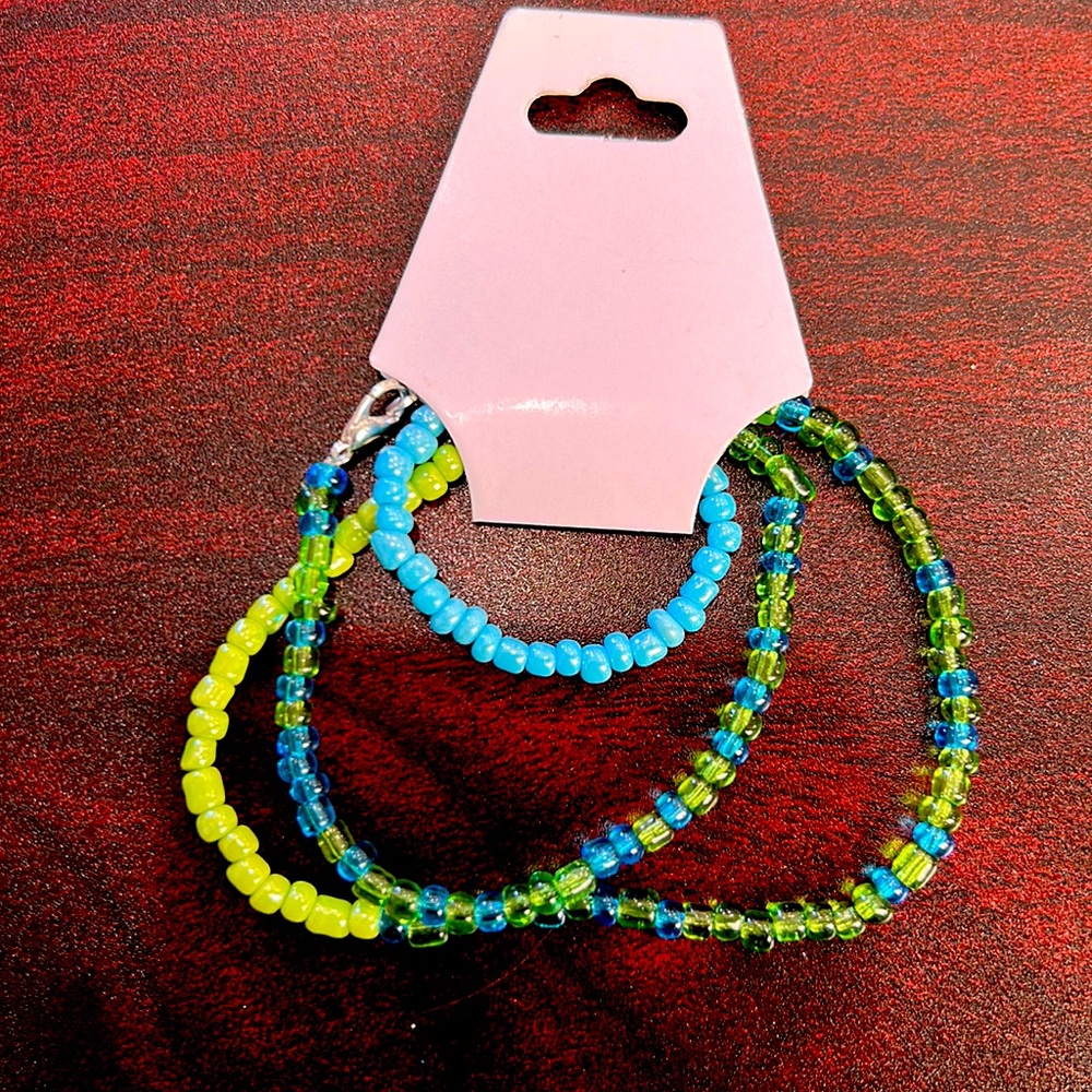 20 1/2in light blue and light green belly chains also with clear light colors
